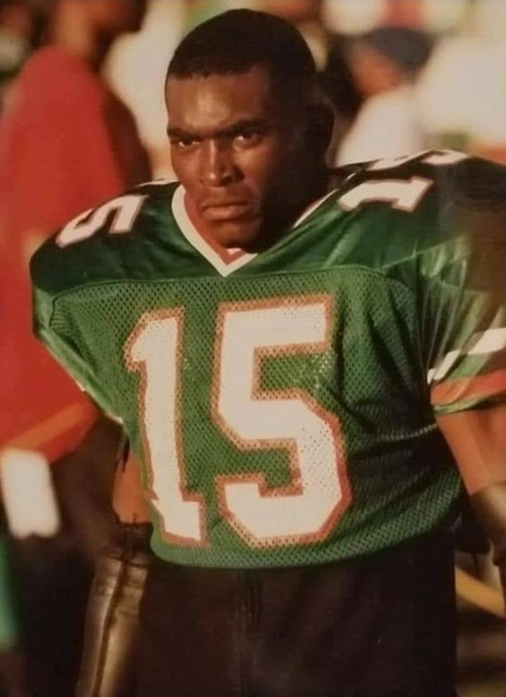 Coach BoJack in FAMU green jersey #15