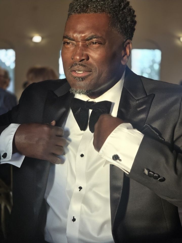Coach Boris BoJack Jackson in formal tuxedo