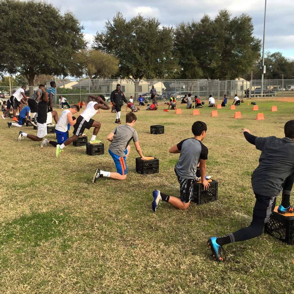 Speed Plus Academy athletes running track drills